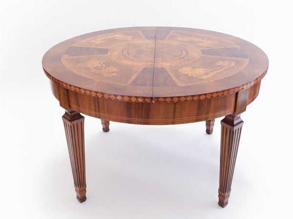 A walnut veneered table