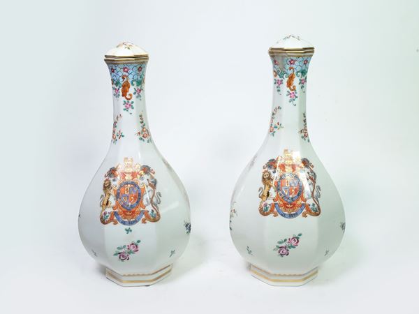 Pair of polychrome porcelain bulb vases, Porcelaine de Paris, France