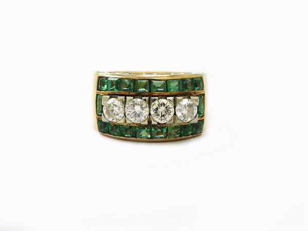 Yellow gold band ring with diamonds and emeralds