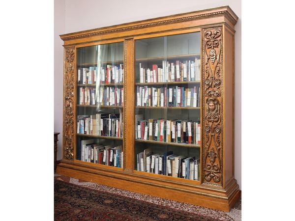A large lacquered and giltwood bookcase