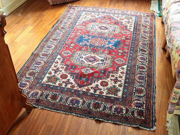 Three Persian carpets