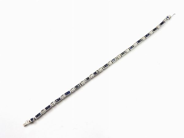White gold tennis bracelet with diamonds and sapphires