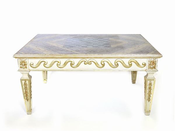 A marble and giltwood table