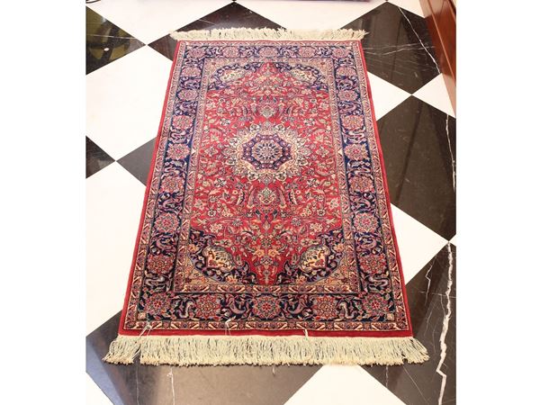 Three persian carpets