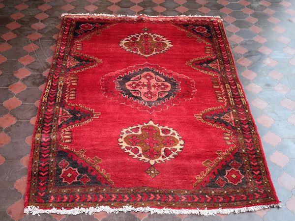 A persian carpet  - Auction Lazzi's House - first part Furniture, paintings, Murano glass, curiosities - Maison Bibelot - Casa d'Aste Firenze - Milano