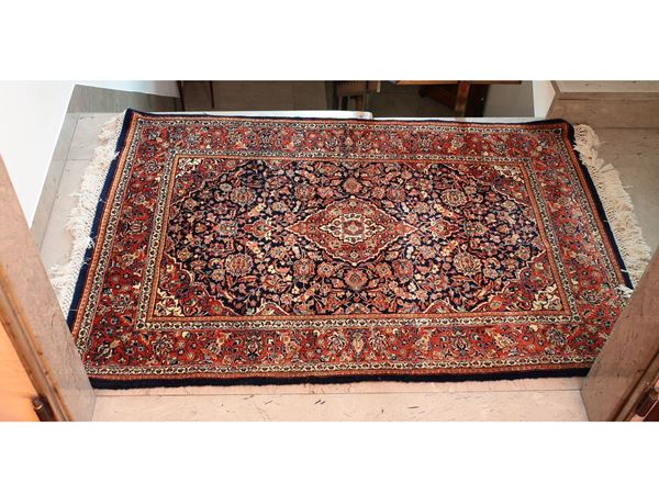 A persian carpet  - Auction Lazzi's House - first part Furniture, paintings, Murano glass, curiosities - Maison Bibelot - Casa d'Aste Firenze - Milano