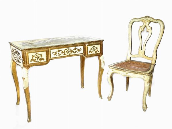 A little lacquered and giltwood writing desk