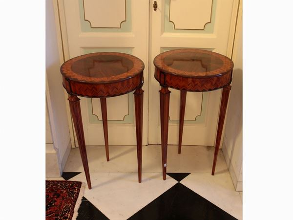 A couple of rosewood and mahogany veenered small tables