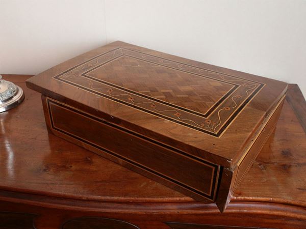 A walnut and other woods box