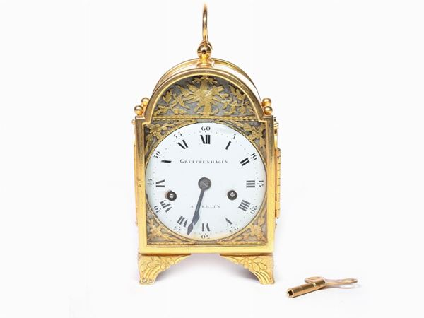 A gilded bronze ufficialina clock, Greiffenhagen Berlin