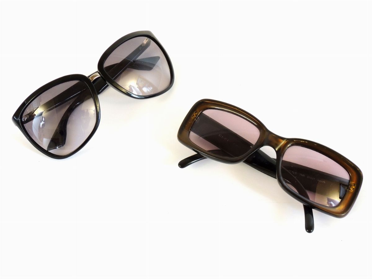 Quattro Paia di Occhiali da Sole, Gucci, Emporio Armani e Versace