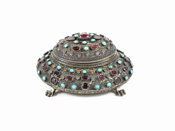 A silver and precius stones jewelry box