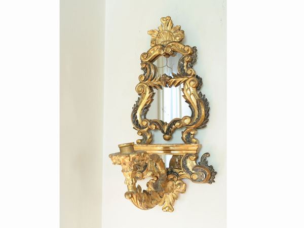 A pair of giltwood appliques