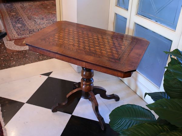 A walnut and other woods veenered small table