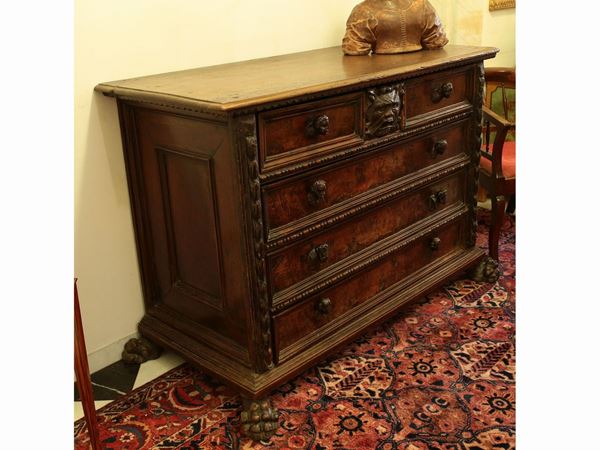 A walnut chest of drawers