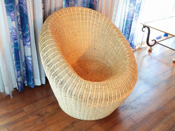 A wicker armchair  - Auction Furniture, old master paintings and curiosity from florentine house - Maison Bibelot - Casa d'Aste Firenze - Milano