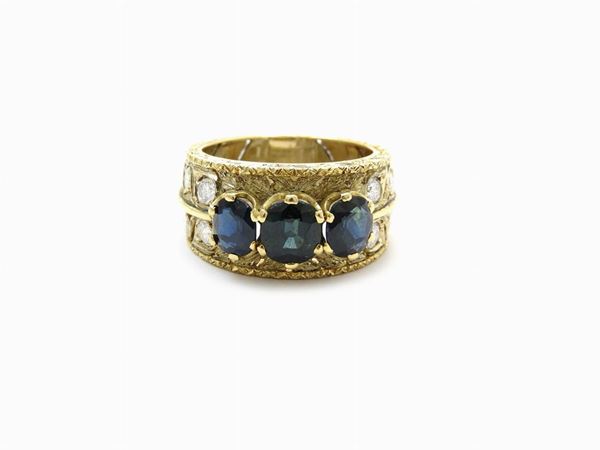 Yellow gold Favilli band ring with diamonds and sapphires