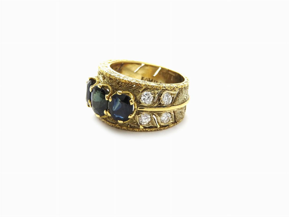 Anello a Fascia in Oro Giallo Favilli con Diamanti e Zaffiri