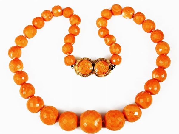 Graduated faceted orange coral necklace