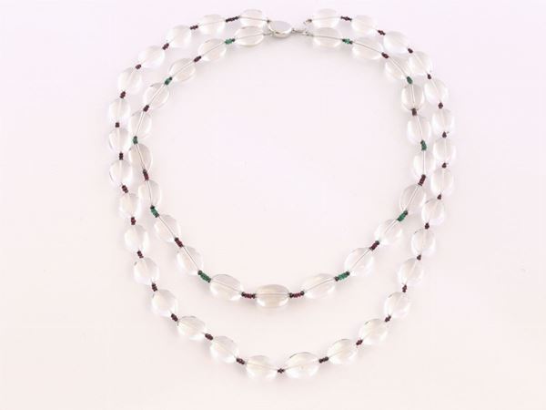 Two strands slightly graduated hyaline quartz necklace with black diamonds, rubies and emeralds