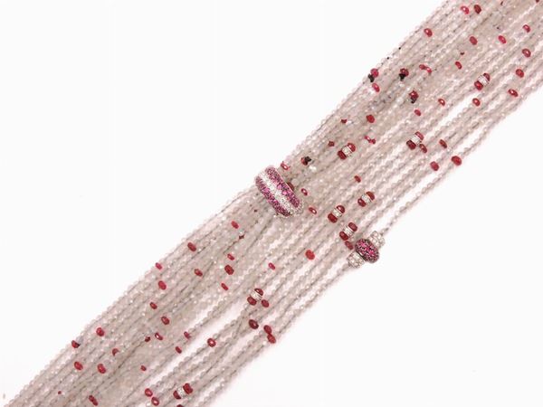 Nine strands moonstone modular necklace with white gold spacers and clasp, diamonds and rubies