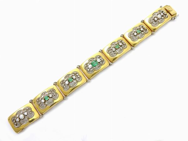 Yellow gold panel bracelet with diamonds and emeralds