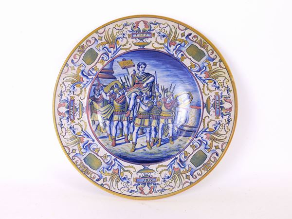 An enamelled ceramic plate, probably Gualdo Tadino  (begin of 20th century)  - Auction Furniture and Old Master Paintings - Maison Bibelot - Casa d'Aste Firenze - Milano