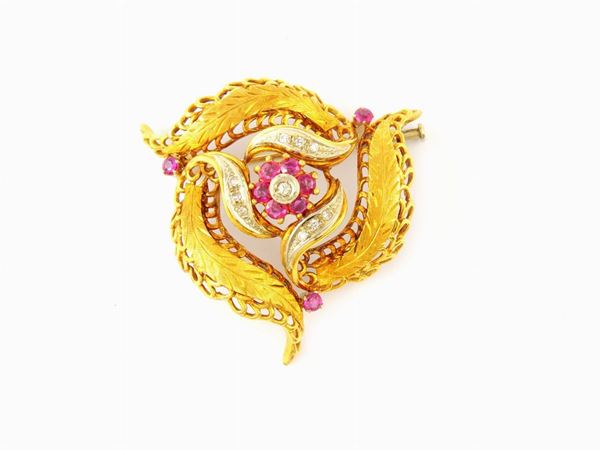 White and yellow gold brooch with diamonds and rubies