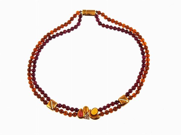 Two strands Manfredi garnet necklace with yellow gold clasp and spacers, diamonds and tourmalines