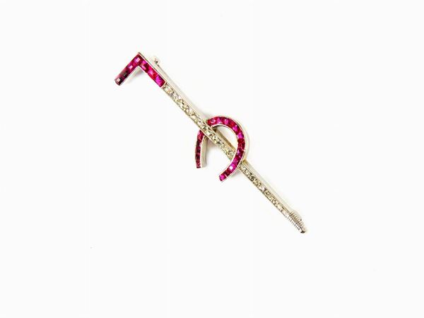 Platinum and yellow gold brooch with diamonds and rubies