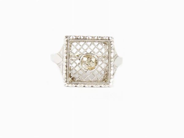 White gold pinky ring with diamond