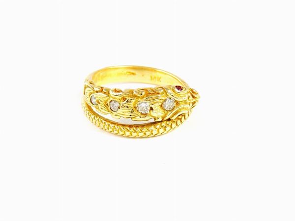 14KT yellow gold animalier-shaped ring with diamonds and rubies