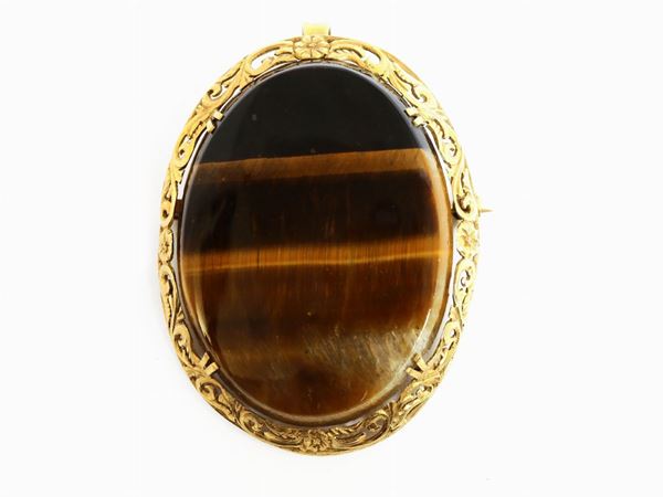 Yellow gold brooch pendant with tiger's eye quartz