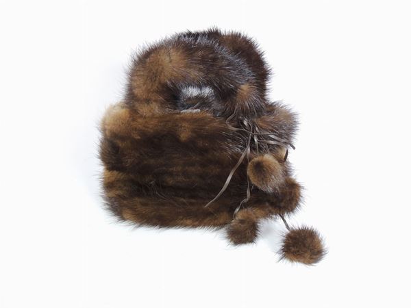 A brown mink mini bag