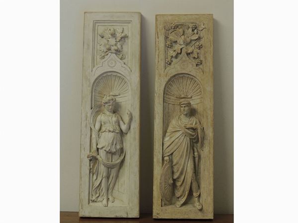 A pair of plaster high reliefs