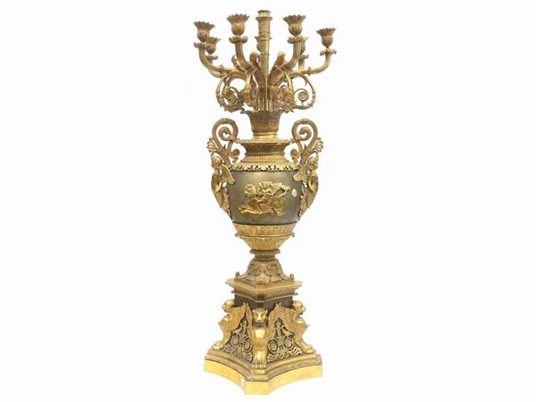 An ormolu flambeau  (20th century)  - Auction Antiquities, Interior Decorations and Vintage  from the Panarello Gallery in Taormina - Maison Bibelot - Casa d'Aste Firenze - Milano