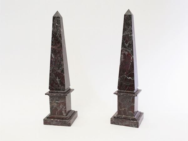 A pair of red Levanto marble obelisks