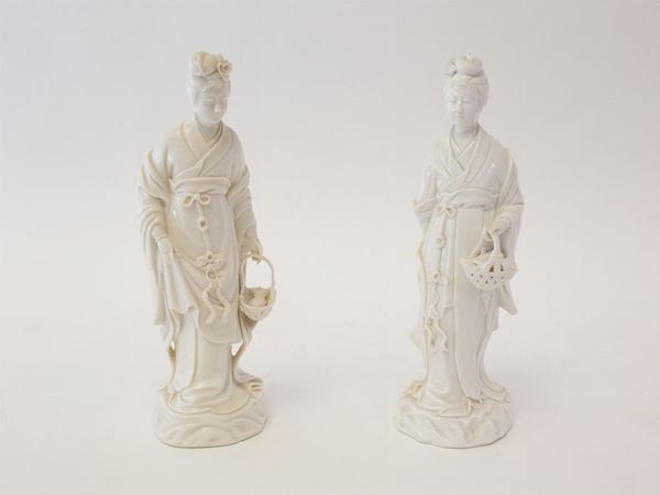 A pair of china sculptures