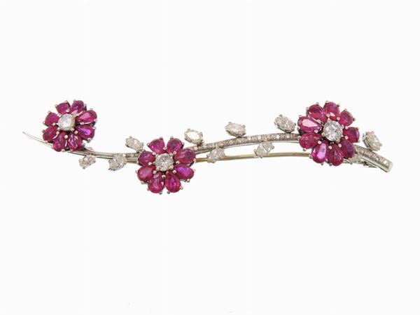 White gold brooch with diamonds and rubies