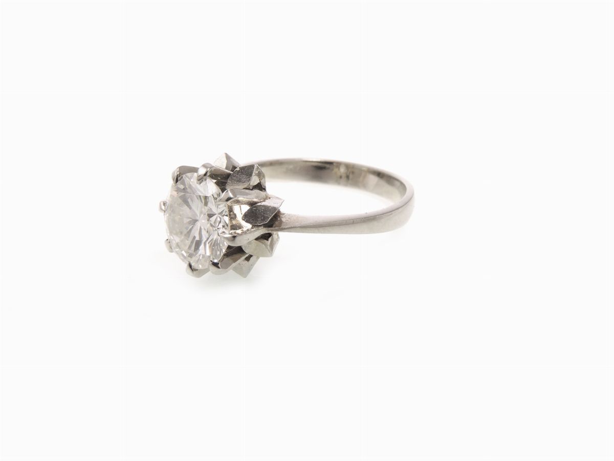 Anello Solitario in Oro Bianco con Diamante