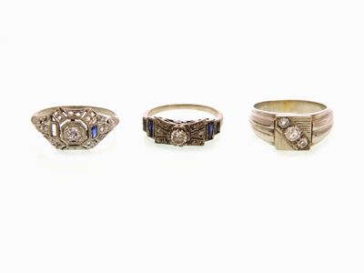 Tre Anelli in Oro Bianco con Diamanti e Pietre Blu