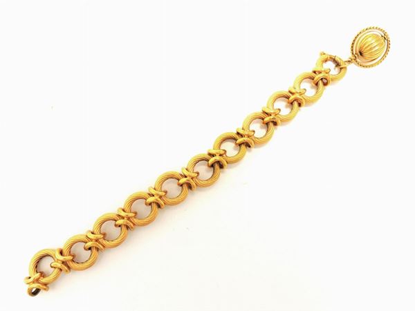 Yellow gold bracelet with pendant