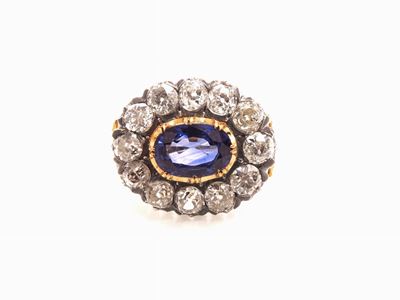 Anello a Margherita in Oro Giallo e Argento con Diamanti e Zaffiro