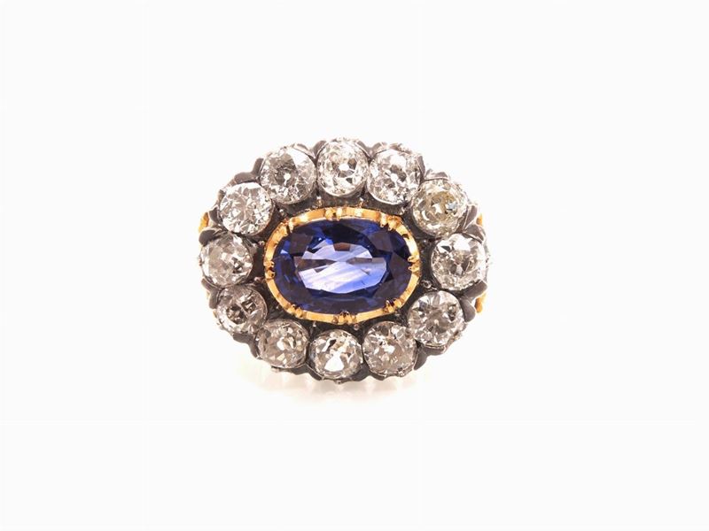 Anello a Margherita in Oro Giallo e Argento con Diamanti e Zaffiro