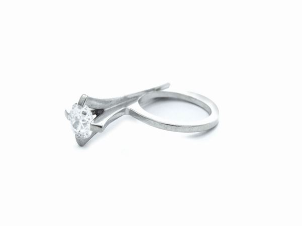 White gold design pinky ring with diamond