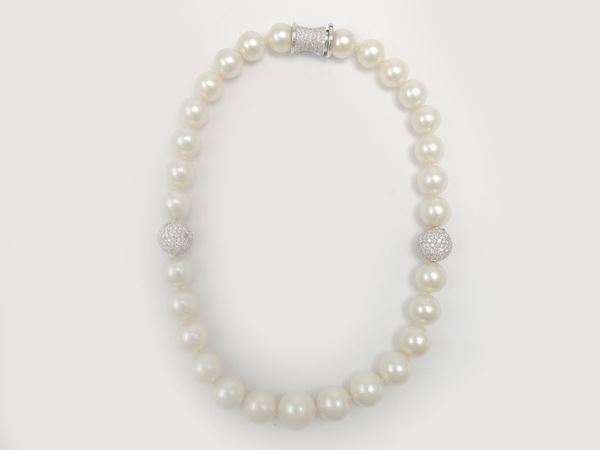 Demi parure of white gold necklace and earrings with diamonds and South Sea pearls