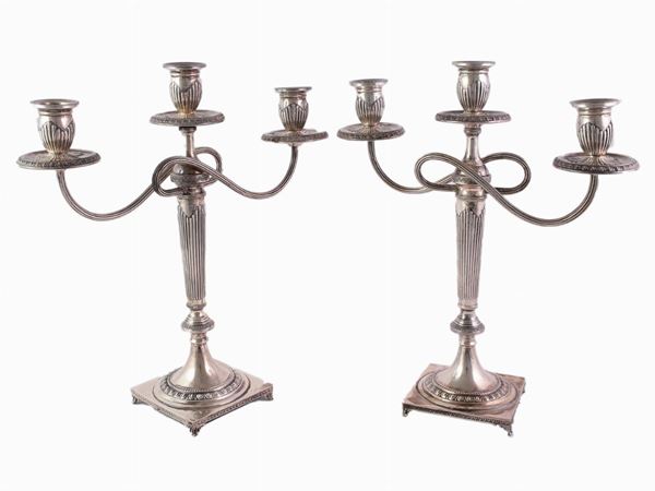 Coppia di candelabri in argento