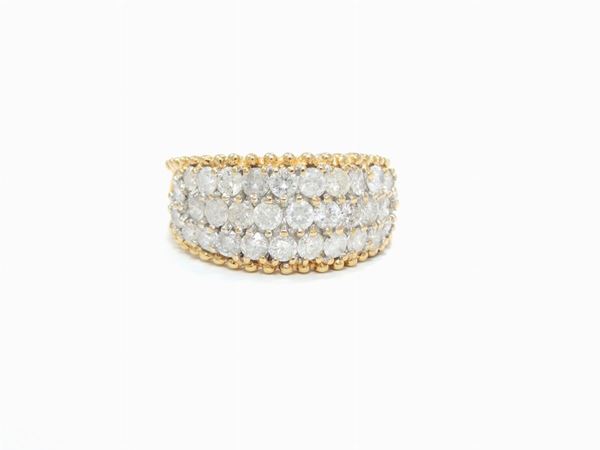 12KT yellow gold band ring with diamonds