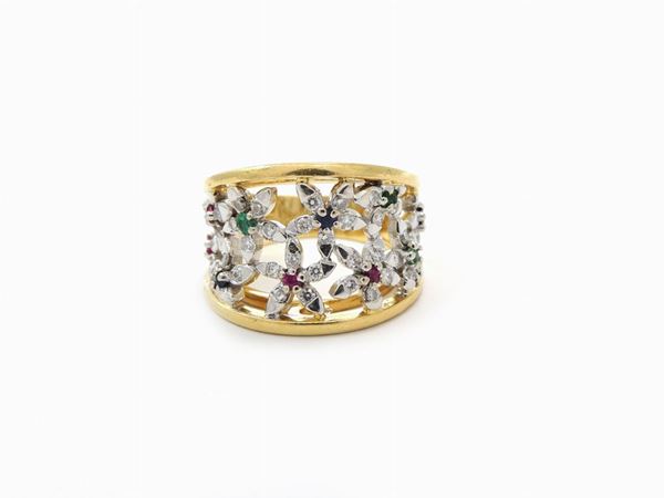White and yellow gold band ring with diamonds, rubies, sapphires and emeralds