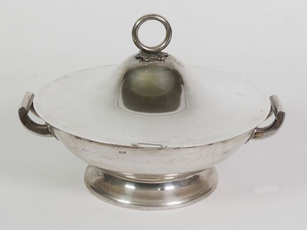 A silver soup bowl